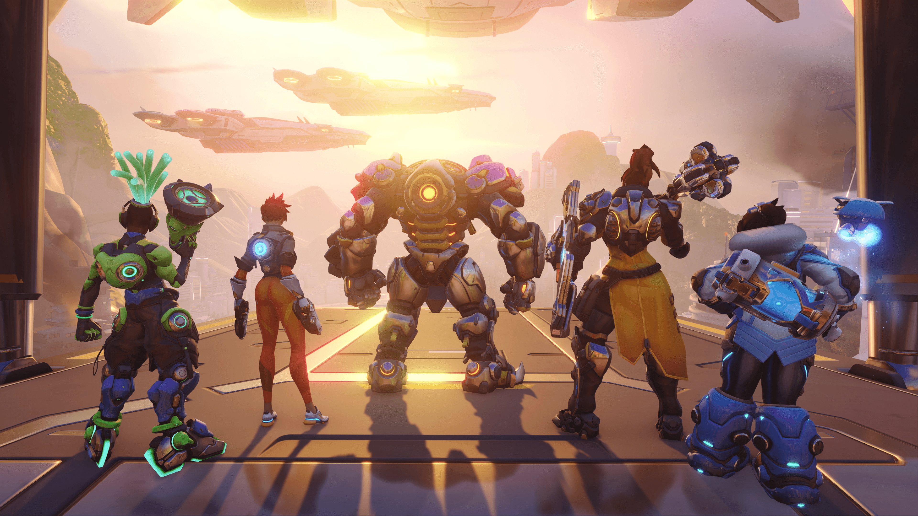 Overwatch heroes staring off into a sunrise